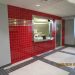 OPCC Snack Bar. Porcelain Floor tille over Schluter Ditra underlayment, and Ceramic Wall Tile with stainless steel accents